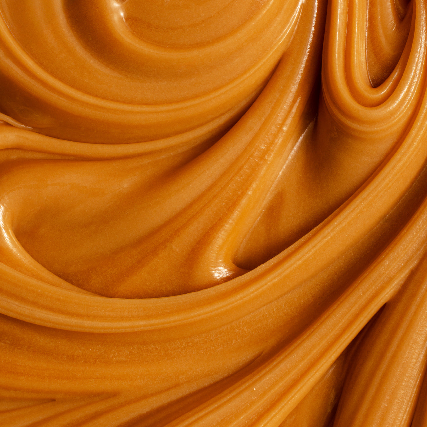 A rich creamy texture of Manuka honey from Manuka Switzerland jar